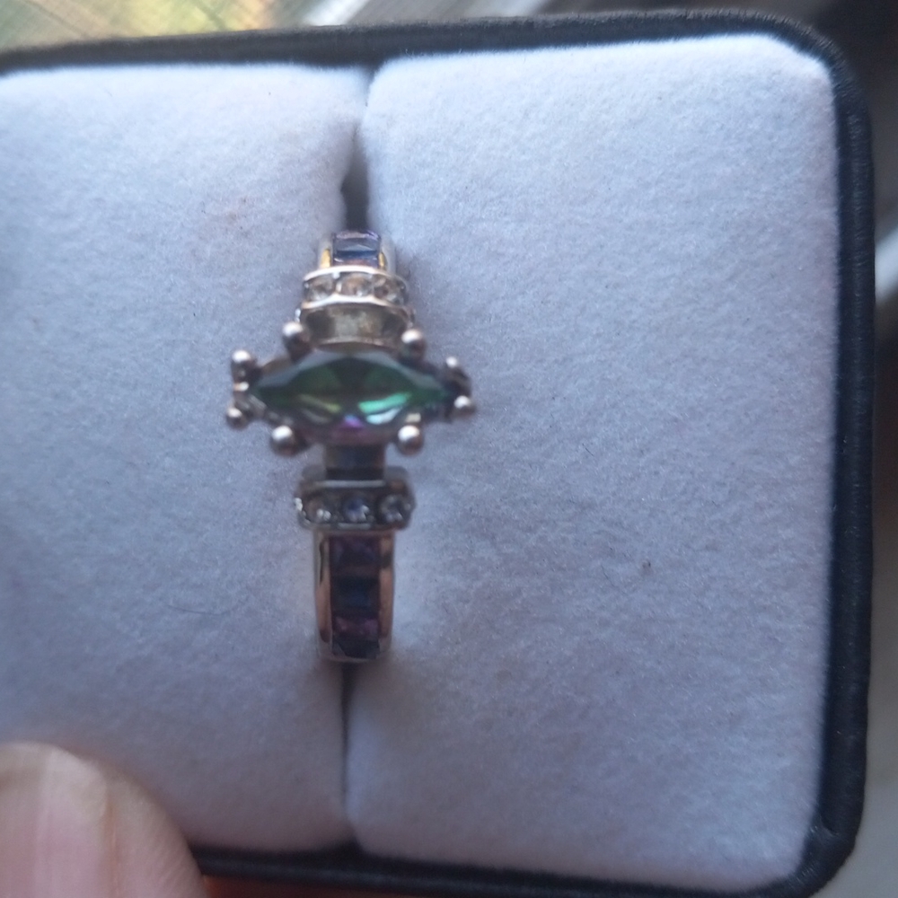 Size 8 green/purple ring